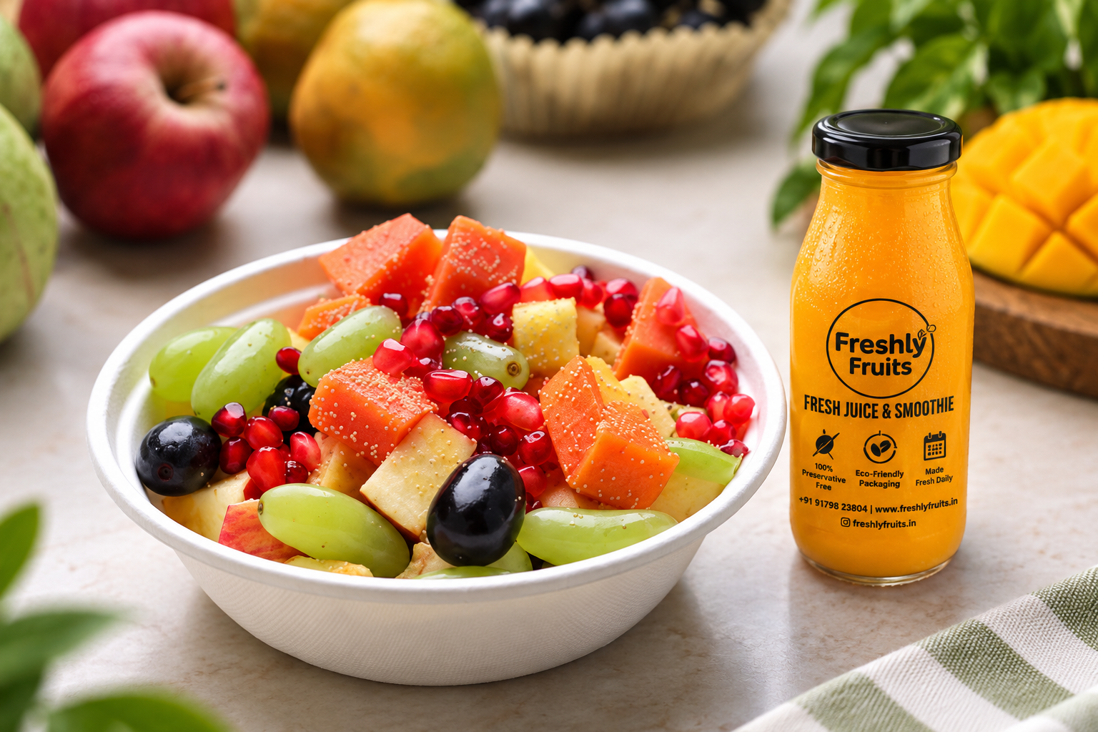 Fresh fruit salad bowl and Freshly Fruits mango smoothie bottle in Indore